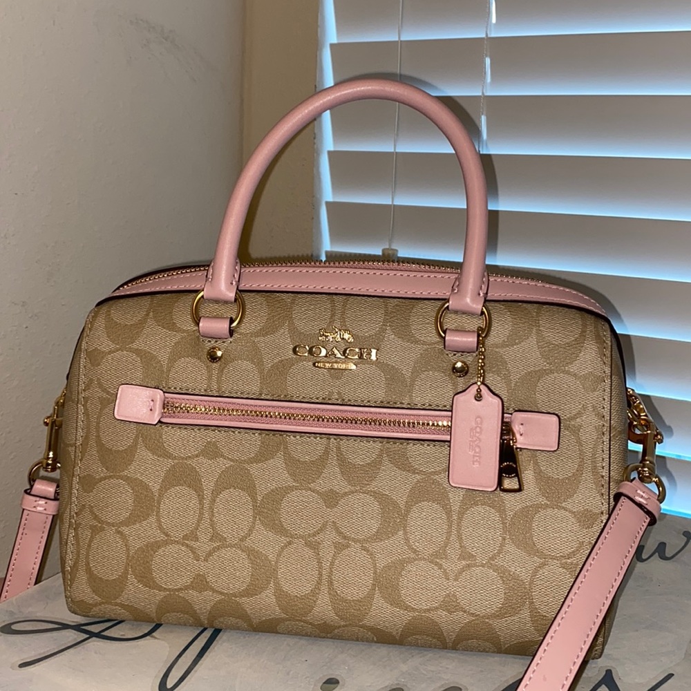 Coach bubble gum pink trim. New without tags.